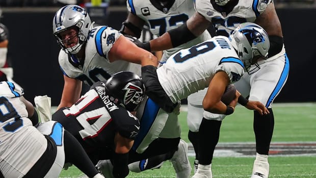 Falcons linebacker Troy Andersen sacks Carolina Panthers quarterback Bryce Young in Week 1, 2023.